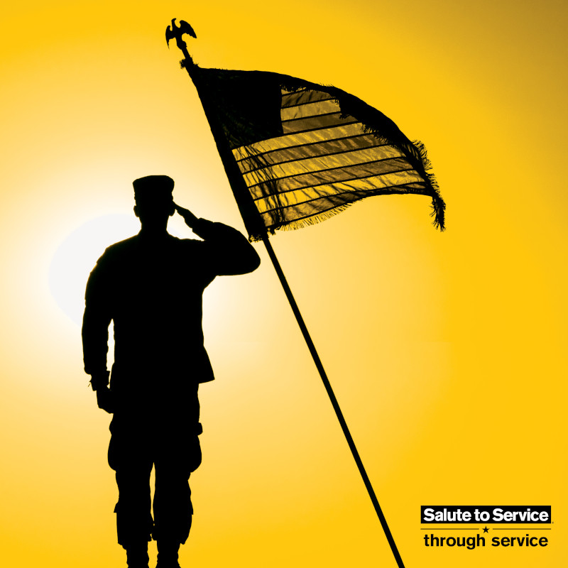 military salute with flag